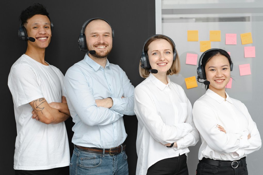 Dedicated ProcurementNation.com support operators handling client calls in modern contact center