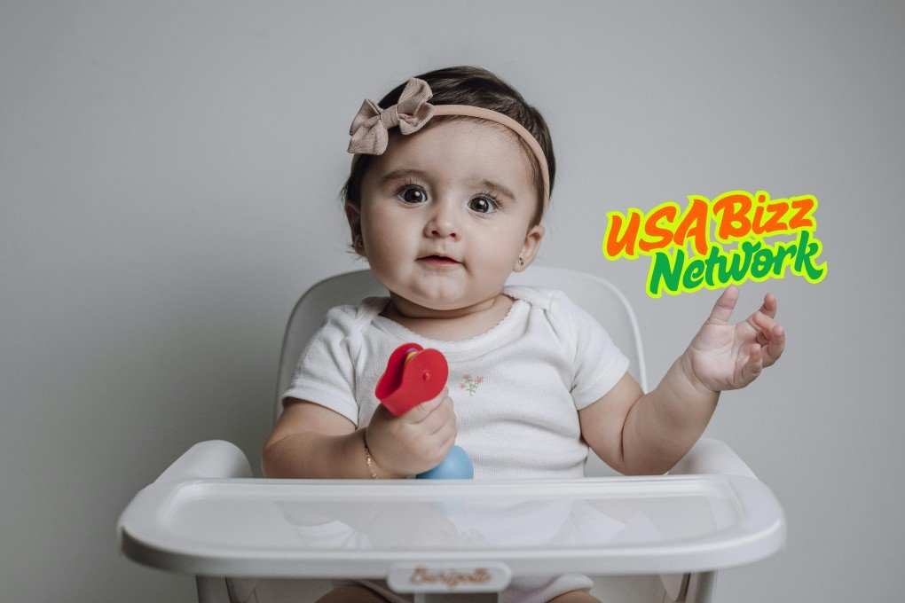 Baby using essential baby and toddler equipment Lumolog for playtime