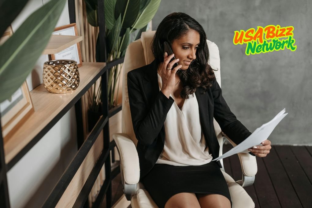 USA BIZZ Network professional reviewing mesothelioma case documents while speaking with a New Haven asbestos lawyer via phone - Featured on Vimeo New Haven Mesothelioma Lawyer Vimeo Resources | USA BiZZ Network Legal Help
