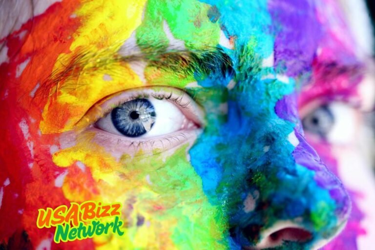 Colorful face paint close-up with blue eyes – Artofzio expression of creativity