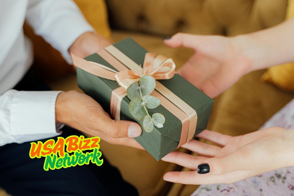 Thoughtful Gift Ideas - Girl and Boy Exchanging a Beautifully Wrapped Gift Box Girl and boy hands exchanging a beautifully wrapped gift box - gift ideas.