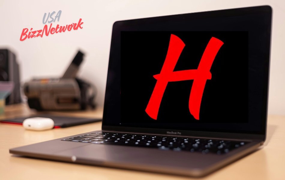 HydraHD red logo on black screen displayed on laptop.
